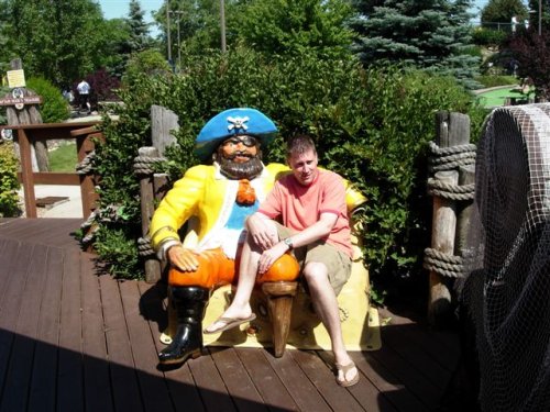 Scott sitting on a Pirate